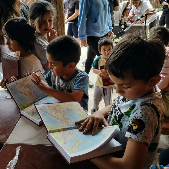 Chergash kids reading New Testament